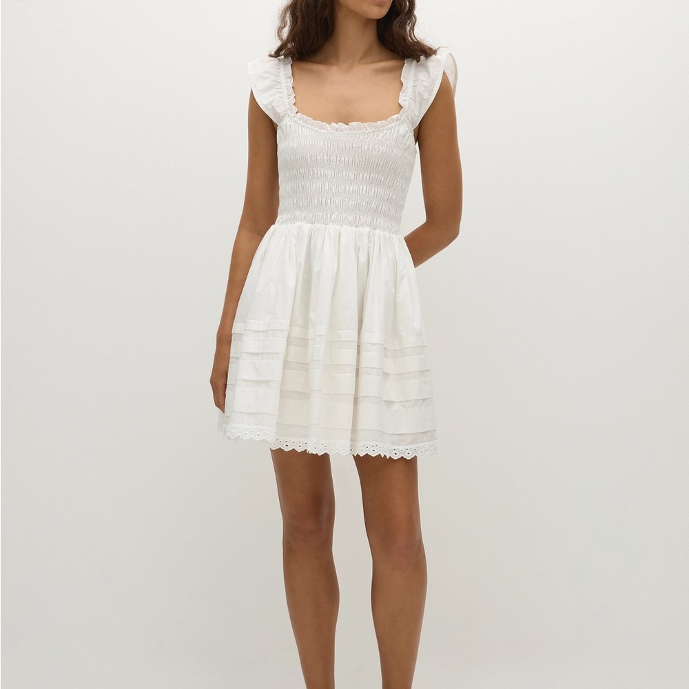 Faithfull the Brand Maja White Smocked Ruffle-Shoulder Mini Dress Feminine Girly